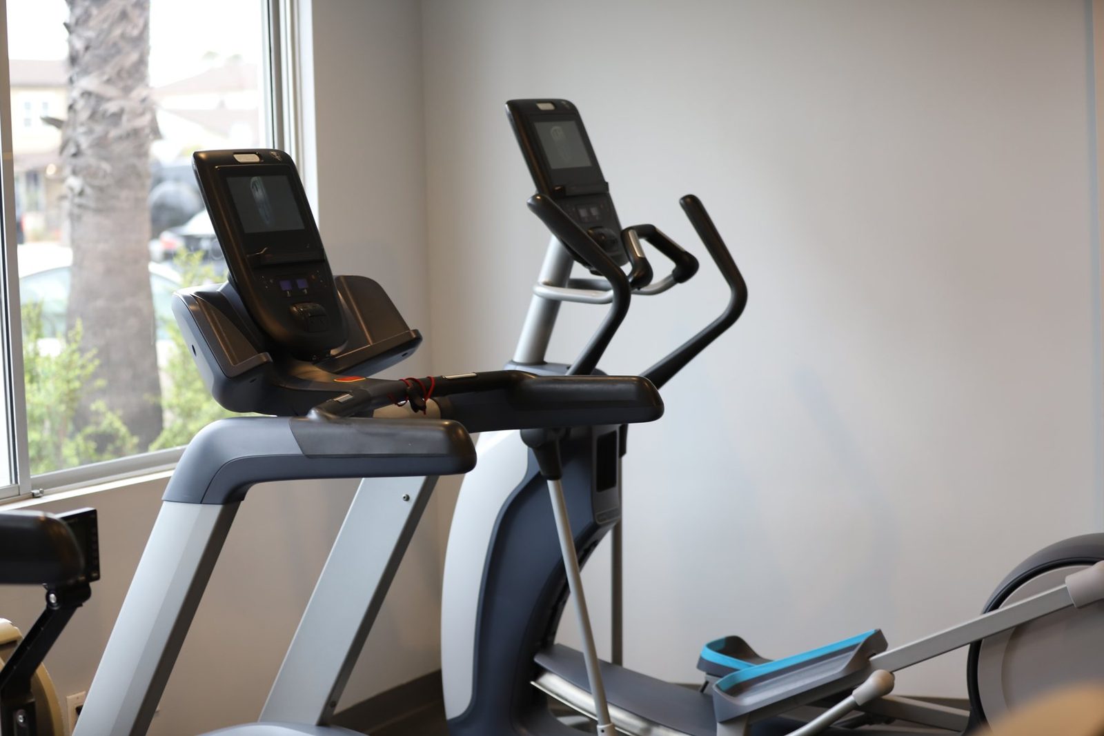 Quarterly biomarker check — coach reviewing data with client