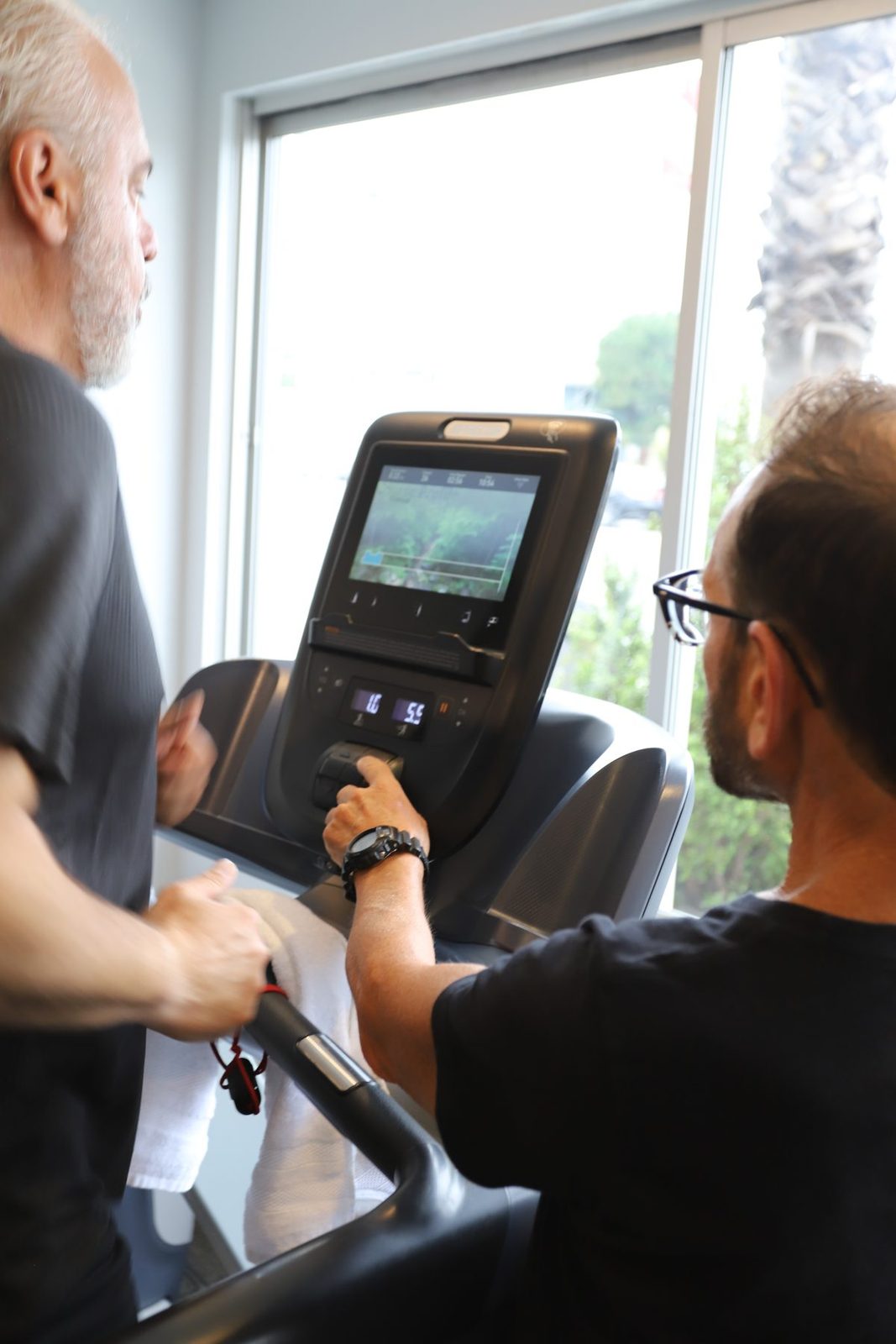 An Executive Fitness coach working one-on-one with a client